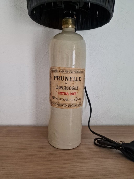 Stoneware lamp with black raffia lampshade