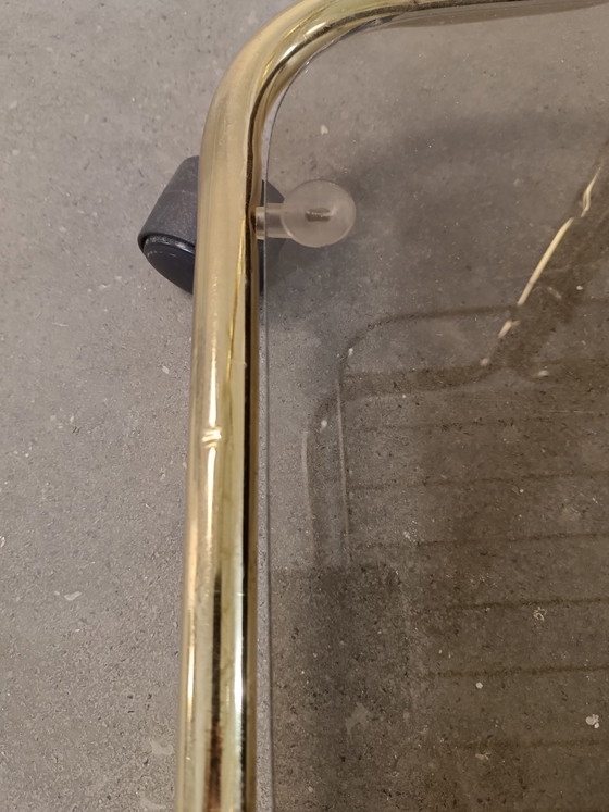 Image 1 of Vintage gold coloured and glass trolley side table 