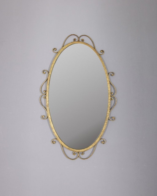 Vintage 1950s gold metal wall mirror designed by Pier Luigi Colli