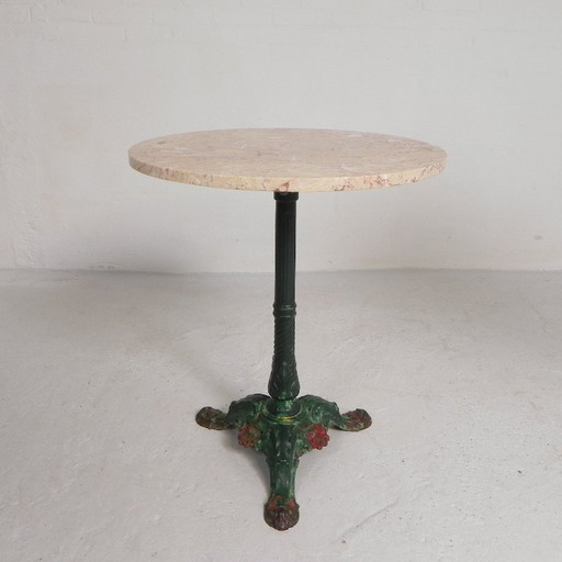 Bistro table with cast iron legs and marble top, 1920s