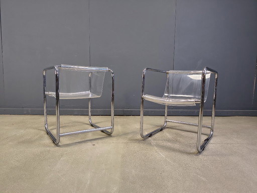 Paire de fauteuils en plexiglas et tubes chromés, années 1970