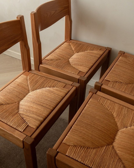 Image 1 of Mid-century eetkamerstoelen van iepenhout en riet van Maison Regain, jaren 70, set van 4