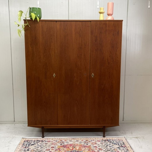 Sleek Danish vintage 3-door wardrobe with hanging and shelving