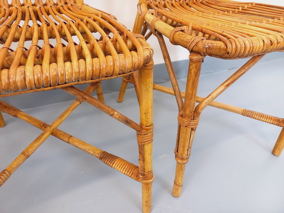 Image 1 of Suite de 4 chaises vintage Audoux Minet en rotin des années 50 60