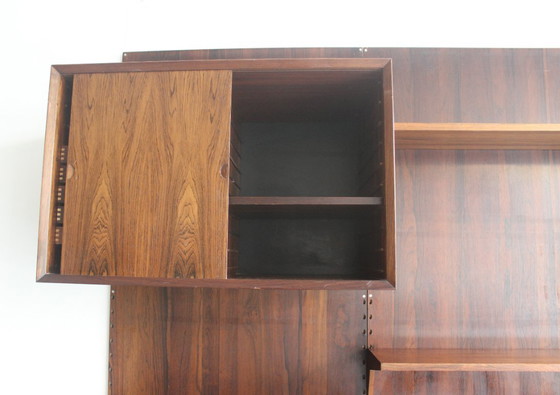 Mueble de pared en palisandro, de Poul Cadovius para Cado, Dinamarca. – Estanterías de pared, Wood (photo 11 of 17)