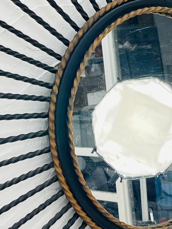 Image 1 of Specchio vintage anni '60 in metallo nero e oro con effetto sole