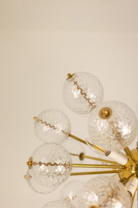 Image 1 of Kamenicky Senov, editor. Pair of brass and glass chandeliers. Circa 1970