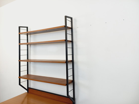 Image 1 of Italian modernist desk with built-in modular string bookcase in teak, metal and melamine from the 60s