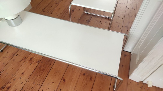 Image 1 of 2 tables design en tubes chromés