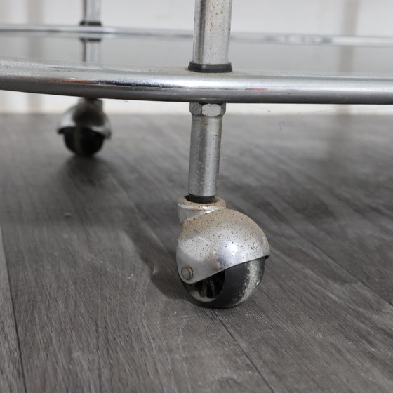Image 1 of Stalen voedseltrolley met dubbele plank en gerookt glas, ontwerp uit de jaren 70