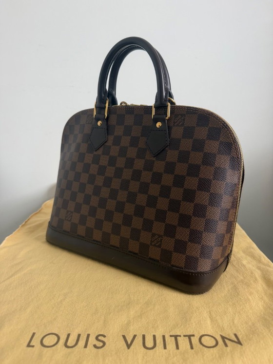 Bolso Louis Vuitton Alma PM – Damier Ebene | De segunda mano | Set completo de coleccionista – Bolsos de mano (photo 3 of 22)