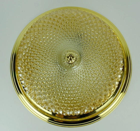 Image 1 of mid century ceiling LAMP flush mount textured amber glass and brass 1970s