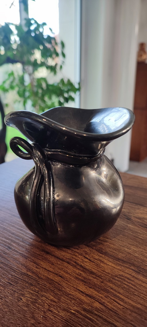 Iridescent ceramic vase from the 1960s, signed
