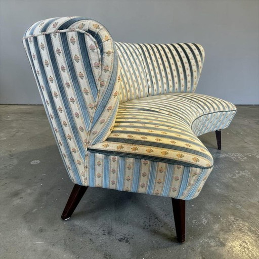 Silla/sofá/sillón de cóctel curvo de estilo vintage.