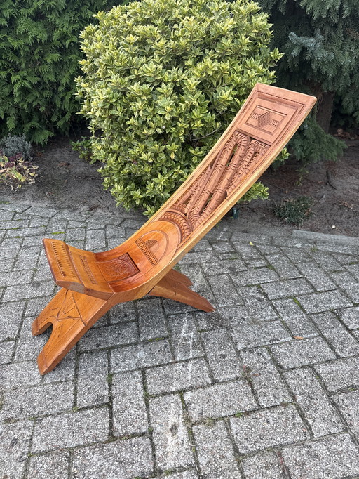 Houten vouwstoel vintage handgesneden 