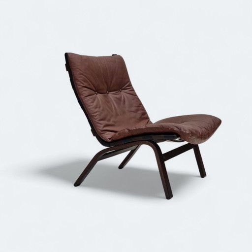 1970, Deense fauteuil van Farstrup, meubelleer, canvas, gebogen hout.