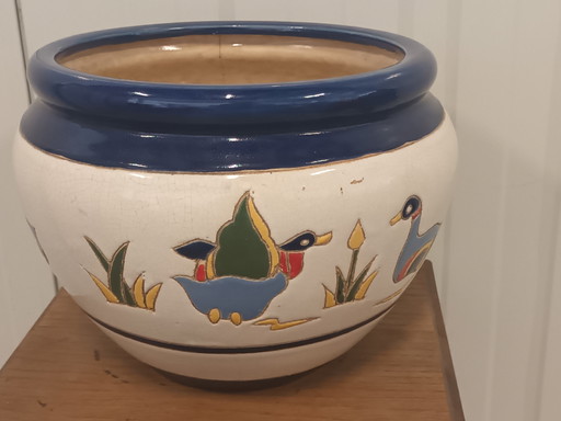 Keramik-Übertopf mit bunten Enten