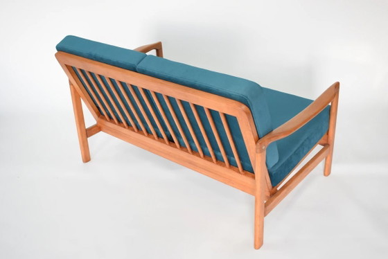 Image 1 of 2-seater BZ sofa bed in blue velvet