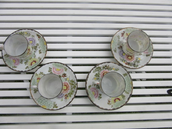 Image 1 of Vintage 4 Asian miniature cups and saucers with gold tone rims new condition