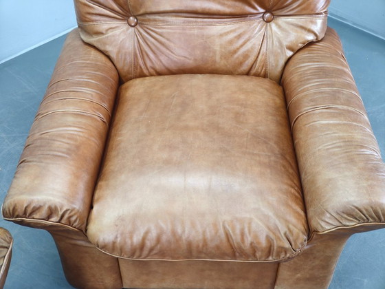 Image 1 of Een paar Arcon Italia loungefauteuils van cognacbruin buffelleer.