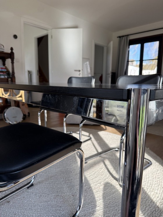 Image 1 of Mesa USM de madera negra y patas cromadas