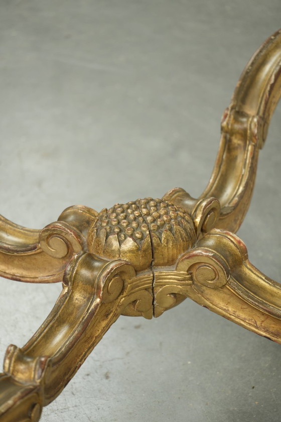 Image 1 of Antique French side table/center table from the 19th century with a gold-colored wooden frame and an original marble tabletop.