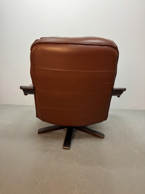 Image 1 of Sillón giratorio Leolux de cuero coñac con estructura de madera contrachapada, Países Bajos, década de 1970