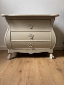 Classic Taupe Dresser With Ornate Shapes