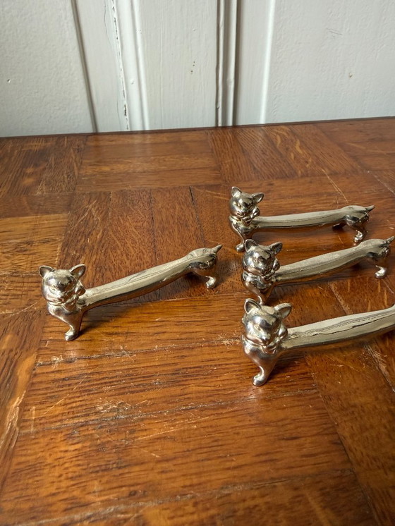 Image 1 of Set di 6 poggiacoltelli a forma di gatto in metallo argentato