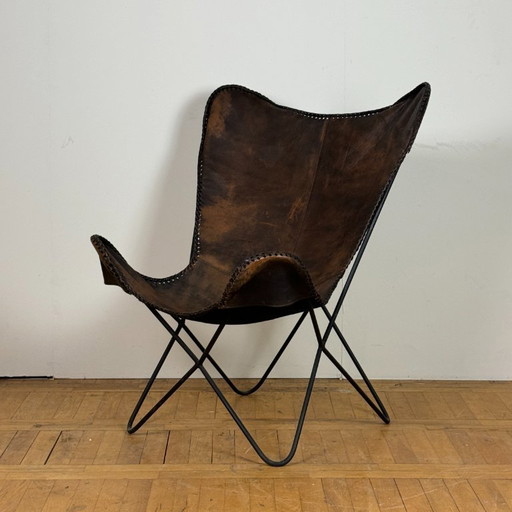 Chaise papillon en cuir vintage 1990