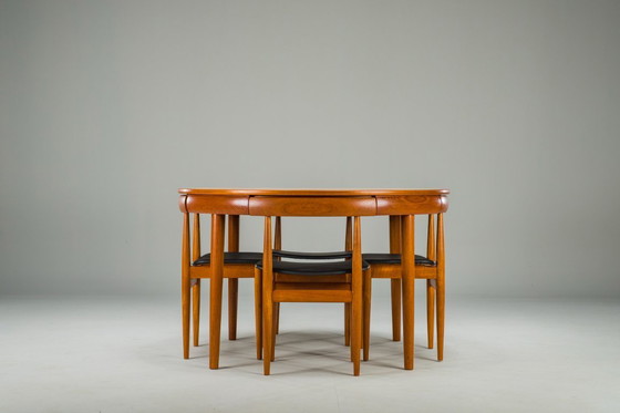 Image 1 of Mesa de comedor extensible y sillas danesas de teca de Hans Olsen para Frem Røjle, años 60, juego de 7