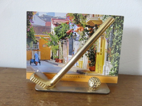 Image 1 of Sujetalibros "Tenis y Golf", 1970