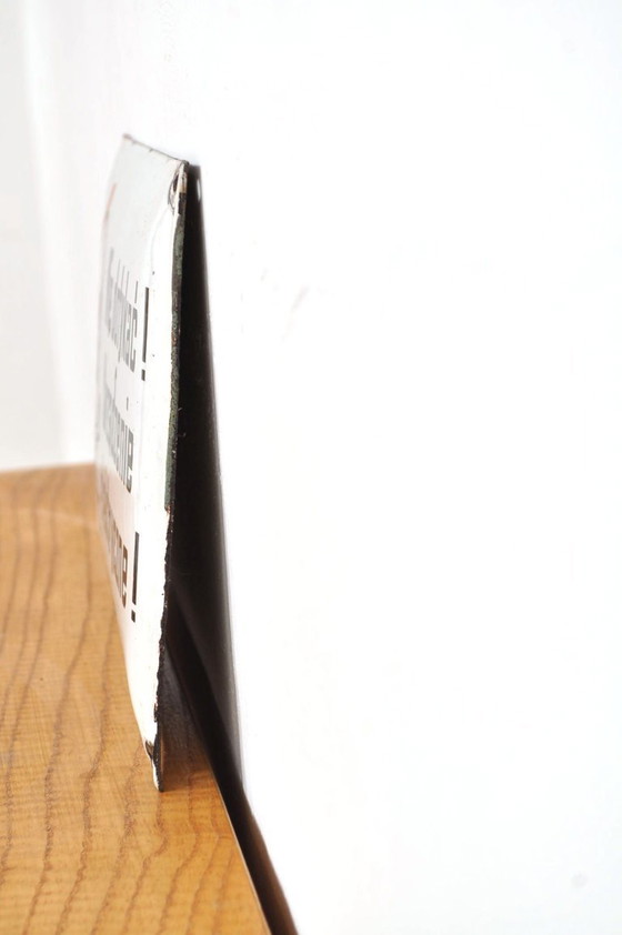 Image 1 of Enamel warning sign skull