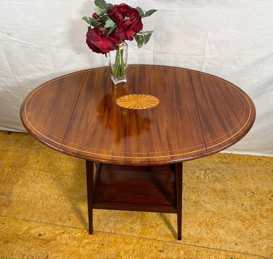 Image 1 of Antique Edwardian Mahogany Oval Drop Leaf Side Table (Circa 1900–1930)  A beautiful antique Edwardian oval drop leaf side table 