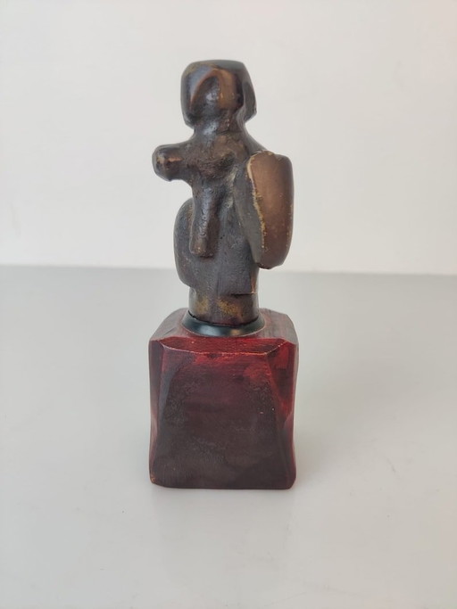 Escultura de bronce