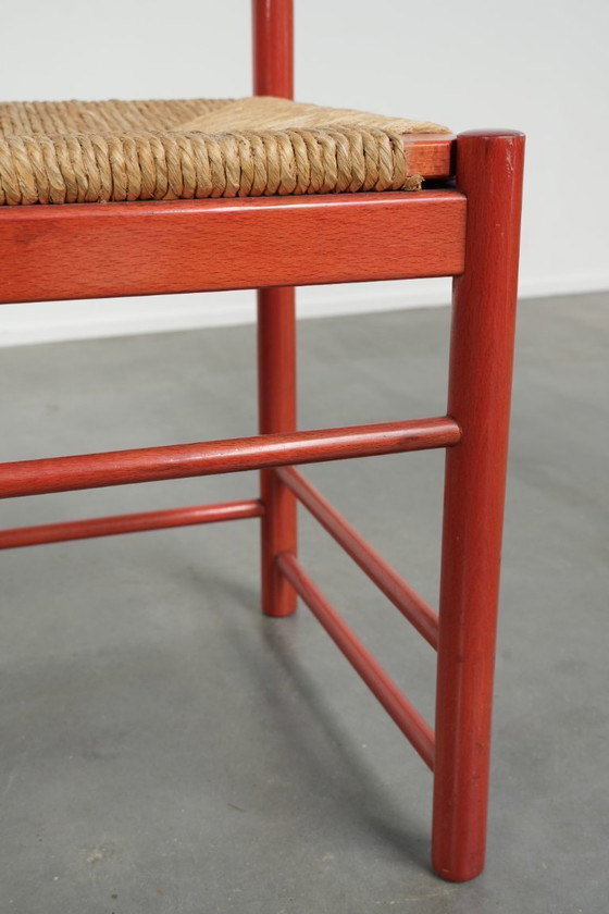 Image 1 of Sedia vintage in legno rosso degli anni '70 con seduta in canna intrecciata.