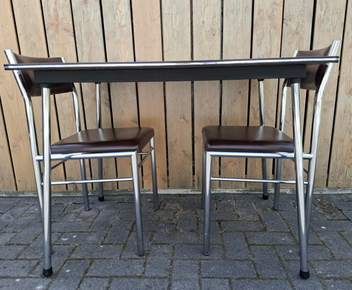 Vintage kitchen table with 2 chairs. 1960s
