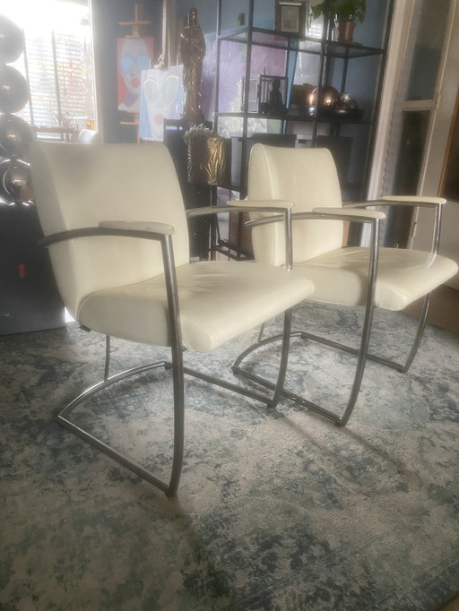 Nomada vintage kalfsleren eetkamerstoelen crème wit 