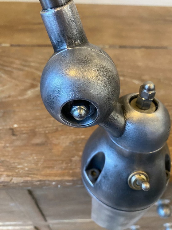 Image 1 of Lampe de bureau Jieldé jielde 2 bras de 40cm et 25cm avec base étau graphite industriel Jean Louis Domecq 1950 vintage