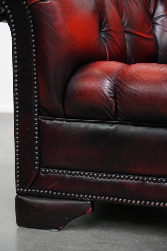 Image 1 of Rode rundleren chesterfield buttonseat fauteuil