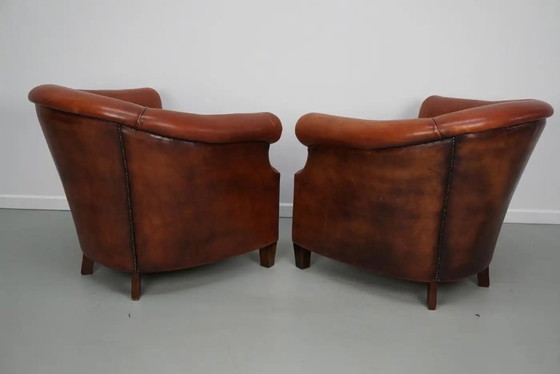 Image 1 of Vintage Nederlandse clubfauteuils in cognackleurig leer, set van 2