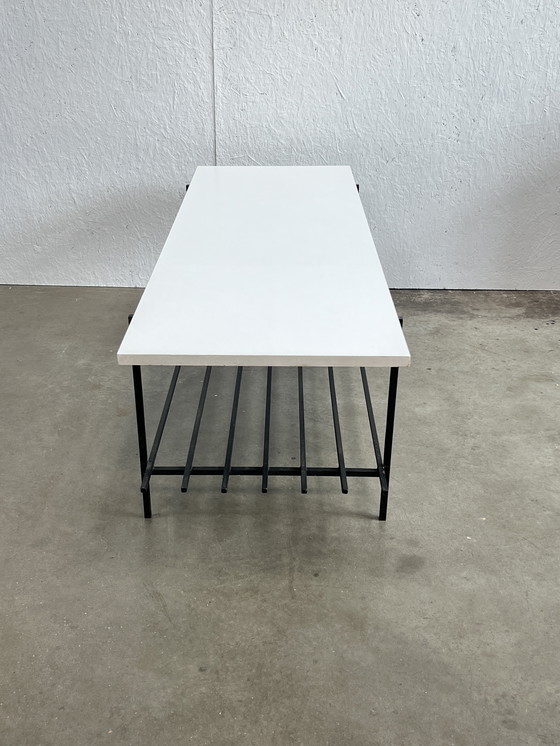 Image 1 of Table basse vintage, plateau en bois blanc sur structure en acier noir. 1970's