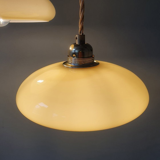 Image 1 of Vintage French pendant lamp set - of pastel yellow opaline glass.