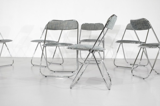 Image 1 of Juego de 9 sillas plegables cromadas con tela de los años 70