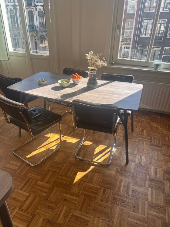 Image 1 of table wood and 4 chairs leather 