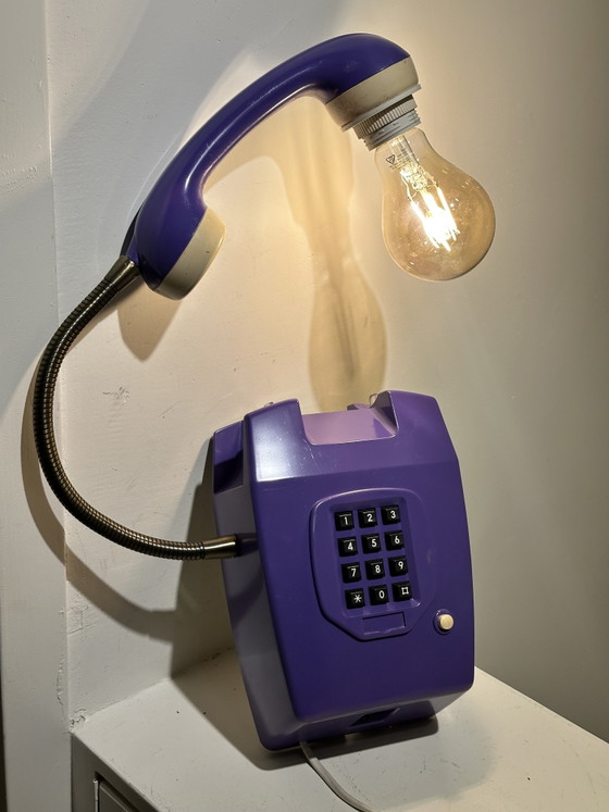 Image 1 of Vintage purple hang-up telephone