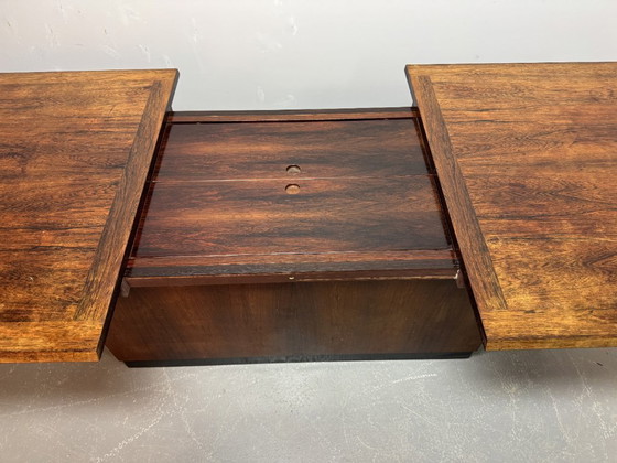 Image 1 of Iconic Mid-Century Sliding Bar Coffee Table in Solid Rosewood with Concealed Bar Compartments by E. Pedersen, Denmark 1960s.