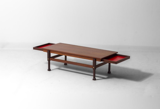 Coffee table with hidden drawers