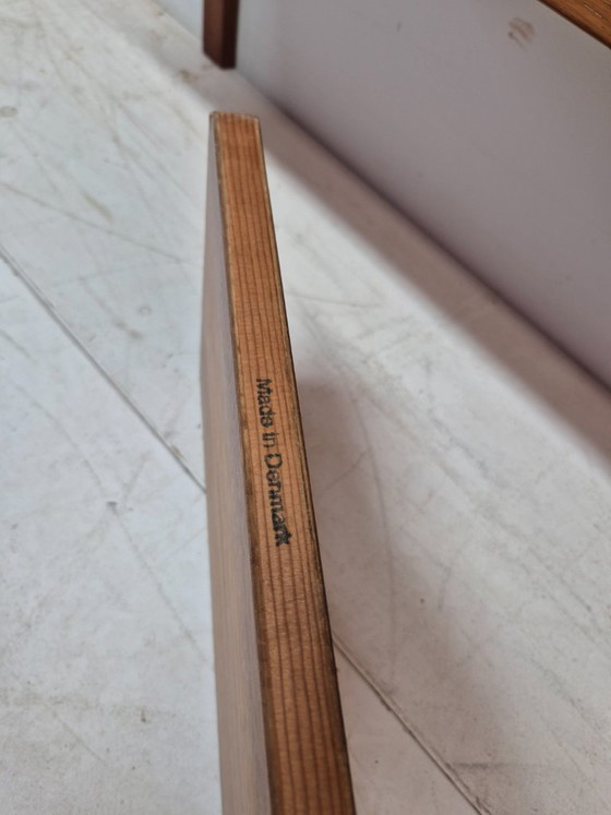 Image 1 of Sistema de estanterías de teca, con la inscripción "Hecho en Dinamarca", 1960.