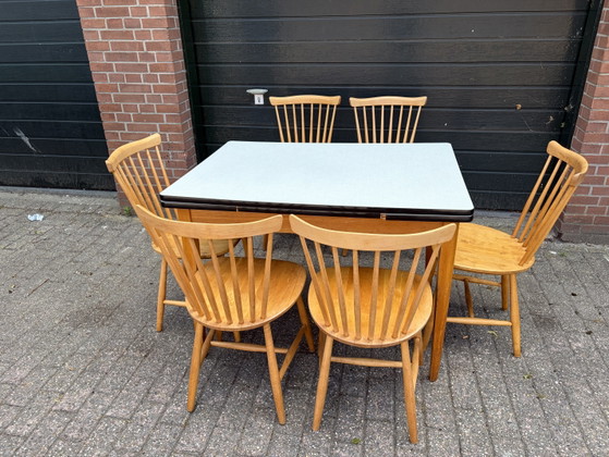 Image 1 of Vintage Pastoe Nesto eethoek tafel + 6 spijlen stoelen